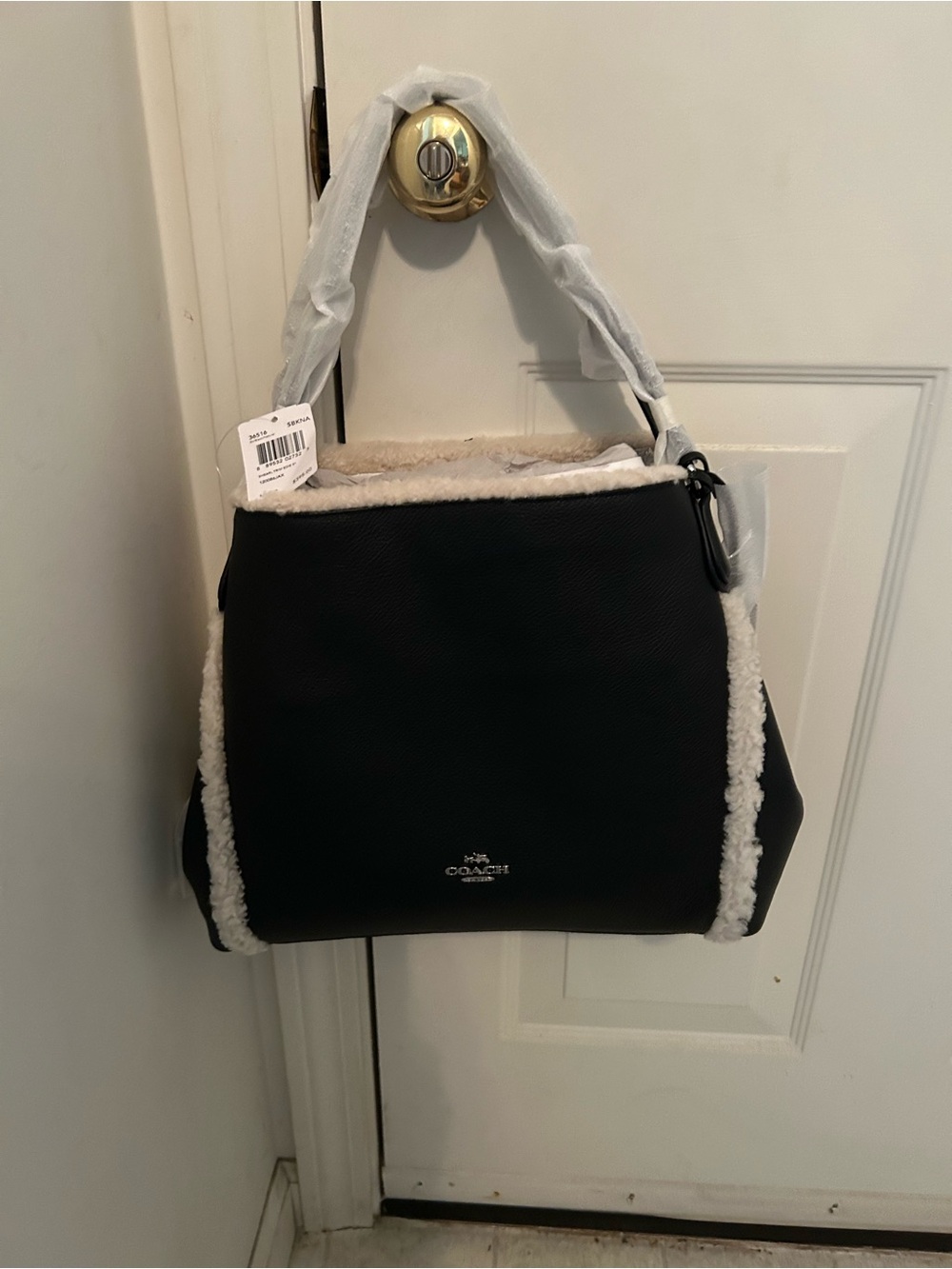 Coach Black Shoulder Bag with Cream Shearling Trim